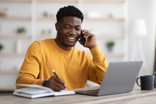 happy-black-man-freelancer-working-from-home-2022-12-16-08-24-33-utc online level 3 courses happy-black-man-completing-his-level-4-iqa-course