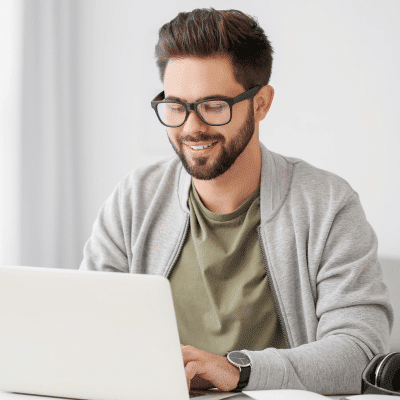 man-working-laptop-home-online-learning